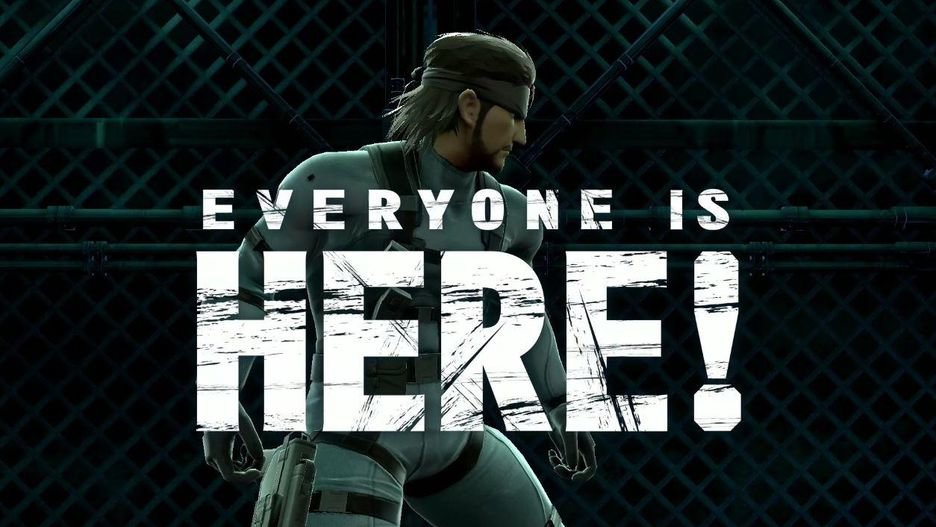 Screencap of a Super Smash Bros. Ultimate trailer, with Snake from Metal Gear Solid in the background and in the front a title card that reads &quot;EVERYONE IS HERE!&quot;
