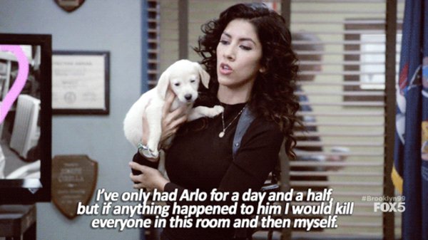 Rosa from B99 holding Arlo