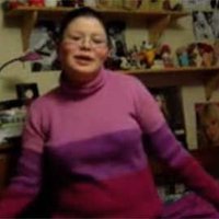 girl in pink and purple shirt