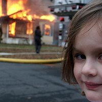 Evil girl looking back at the viewer in front of a burning house