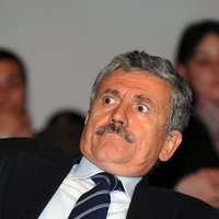 mustached man leaning back in shock