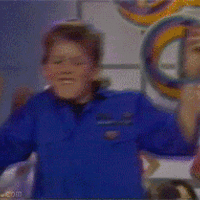 boy in blue shirt dancing