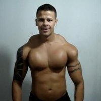 shirtless man with strange bumpy muscles