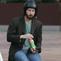 Sad Keanu in a Helmet