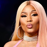 Nicki Minaj Nicki Minaj in a pink and blonde wig making a kissy face