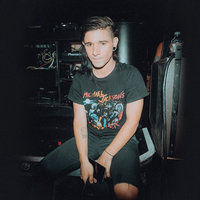 Skrillex sitting 