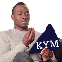 Dashing Black Man Holding Dangerously Large Dorito Chip