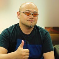 Hideki Kamiya giving a thumbs up
