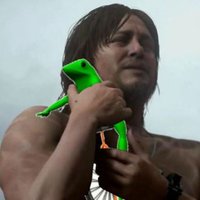 Norman Reedus Holding Things