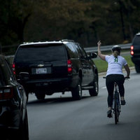 Cyclist Flipping Off Donald Trump's Motorcade