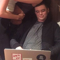 Man Distracted By Laptop