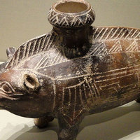 ceramic sculpture of a boar