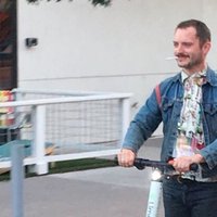 Elijah Wood On a Scooter