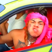 Rapper 6ix9ine in a car