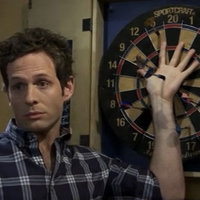 Dennis Reynolds with Dart in Hand