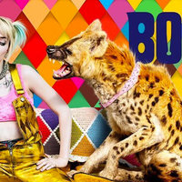 Margot Robbie as Harley Quinn in the Birds of Prey movie leaning on a baseball bat next to her pet hyena