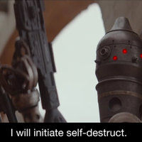 I Will Initiate Self-Destruct Skinny robot IG-11 holding a gun