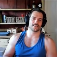 Gamer Henry Cavill Henry Cavill wearing a gaming headset over his head during a live chat with Zack Snyder