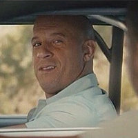 When I See You Again screenshot of vin diesel and paul walker driving next to each other from the film the furious 7.