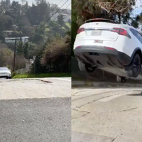 Tesla Model X speeding in LA air flying over bump steep roads