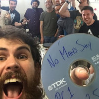 no man's sky development team celebrating the completion of the video game no man's sky