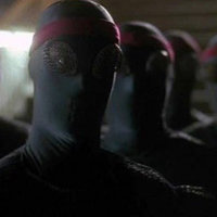 We've Been Waiting for You, Miss O'Neil Five Foot soldiers in face masks and red headbands standing