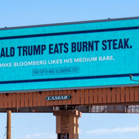 Mike Bloomberg's Anti-Trump Billboards mike bloomberg blillboard that reads "donald trump eats burnt steak"
