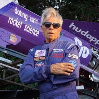 Mike Hughes standing in front of a rocket 