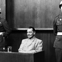 Black and white photo of Hermann Göring during the Nuremberg trials