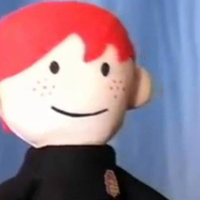 puppet made in the likeness of ron weasley with red hair, red freckles and black shirt in the youtube show "potter puppet pals" a harry potter parody.

The article examines the usage of the potter puppet pal "why must you hurt me this way" reaction. 