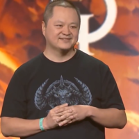 Wyatt Cheng on stage asking the audience DO YOU GUYS NOT HAVE PHONES