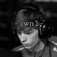 A man playing video games wearing headphones and the letter "IWNL" overlaid atop the picture. 

The article explains the usage of the internet slang acronym -IWNL- which stands for I will never lose
