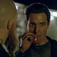 Matthew McConaughey as Rust Cohle in the fourth episode of True Detective smoking a cigarette after taking drugs