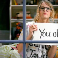 Taylor Swift "You Ok?" Taylor Swift in the you belong with me music video holding a sign that says "you ok?"