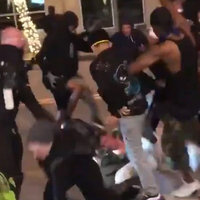 Dallas Sword Guy vs. Protesters Screenshot of the protesters attacking sword guy