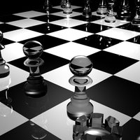 glass chess pieces on a checkered board