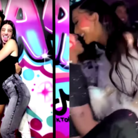 James Charles and Charli D'Amelio hugging in front of graffiti