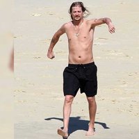 kid rock walking on beach meme