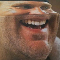 photo of football player ben roethlisberger being split by the crease in a newspaper