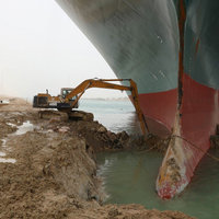 Excavator Digging Out Suez Canal Ship Excavator Digging Out Suez Canal Ship