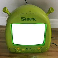 Shrek TV A shrek-themed tv sitting on the floor.