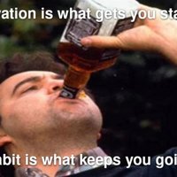 A fitness quote over the image of a man drinking a bottle of whiskey.