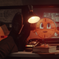 Miss Minutes from the Disney+ Loki show standing on a desk.