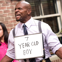 7 Year Old Boy Terry Crews meme format depicting Terry Crews wearing a sign that reads "7 year old boy" from Brooklyn nine nine.