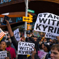 Kyrie Irving Vaccine Protest Stand With Kyrie protestors outside of the Barclays Center in Brooklyn in support of Kyrie Irving's vaccination protest.