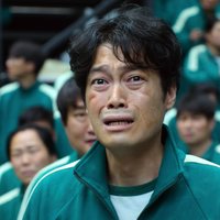 Your Next Task Is... Your Next Task Is meme format and template from the Netflix show Squid Game depicting a man with a worried-looking expression.