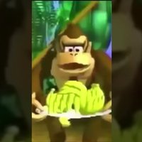 Donkey Kong Oh Great Heavens Meme depicting DK holding a plate of bananas.