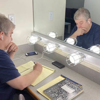 Patton Oswalt Apology Letter meme template and format depicting a photo of Oswalt writing the apology letter about his photo with Dave Chapelle in a mirror.