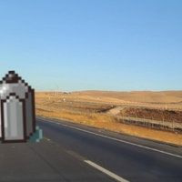 Iron Pencil Statue meme photoshopped onto a road.