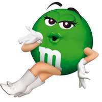 Image of Green M&M blowing a kiss.
